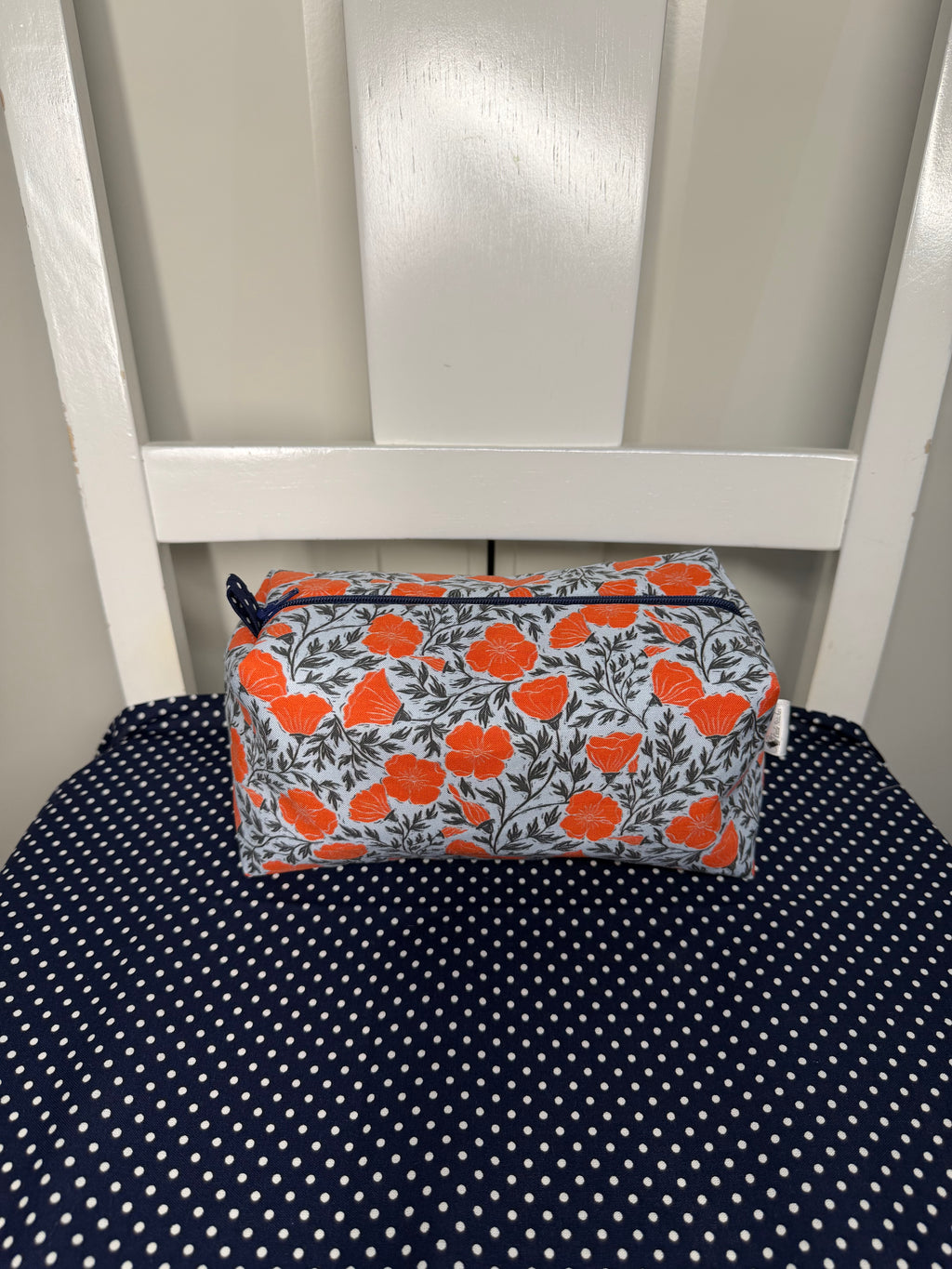 “Orange/Navy Mini Poppy” cosmetic bag