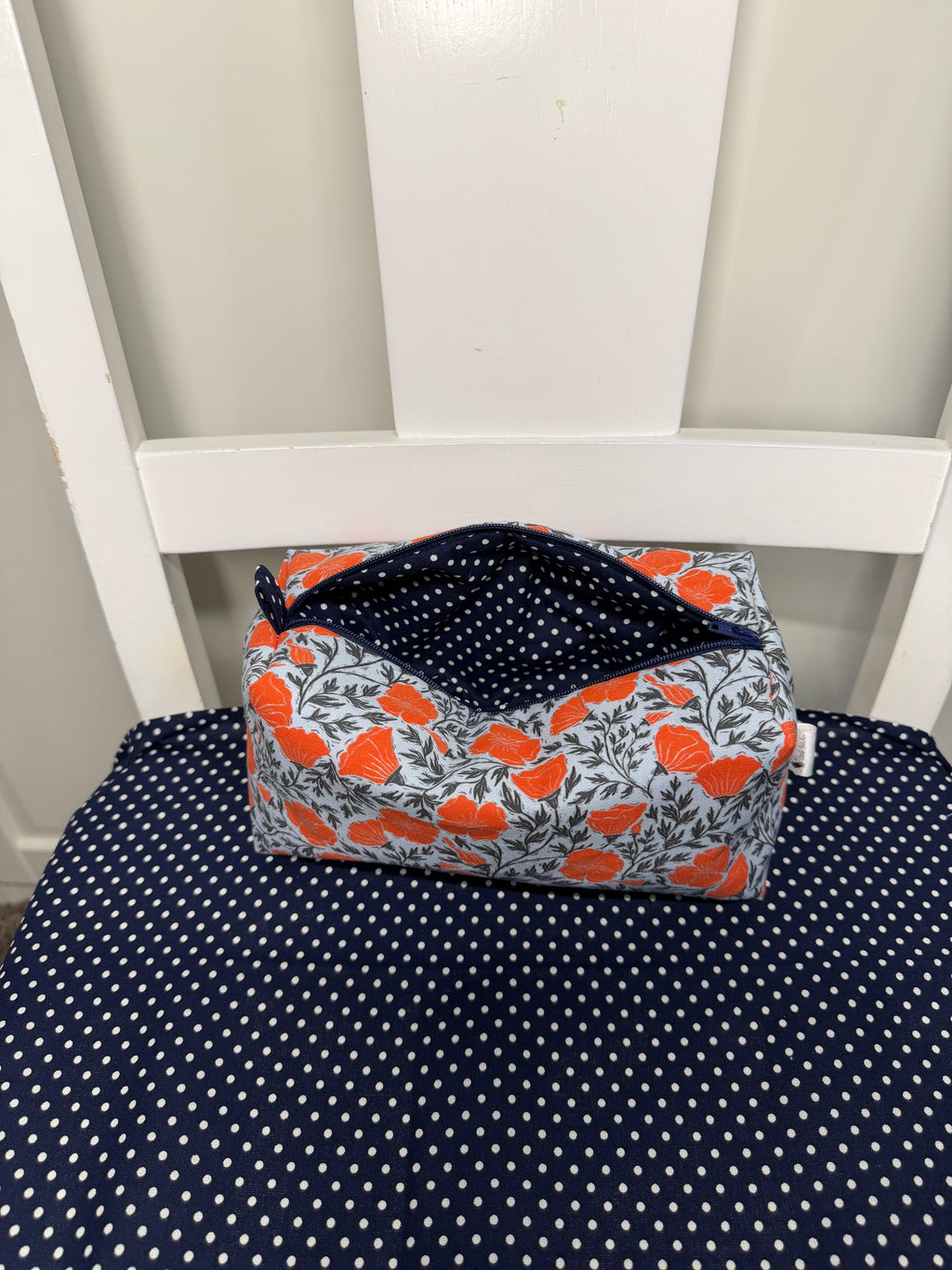 “Orange/Navy Mini Poppy” cosmetic bag